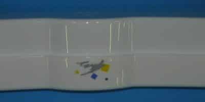 Hűtőajtóba italtartó