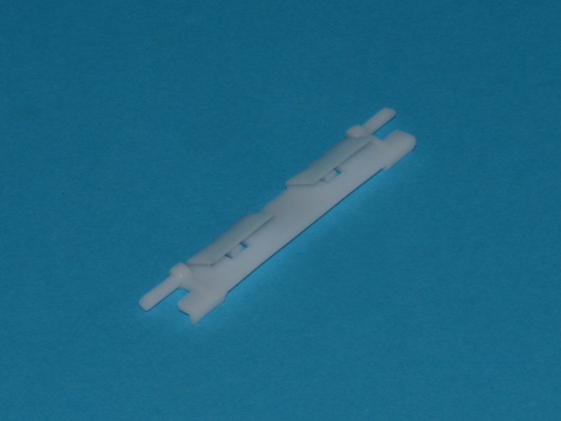 Fagyasztóajtó nyitóhoz műanyag rugó